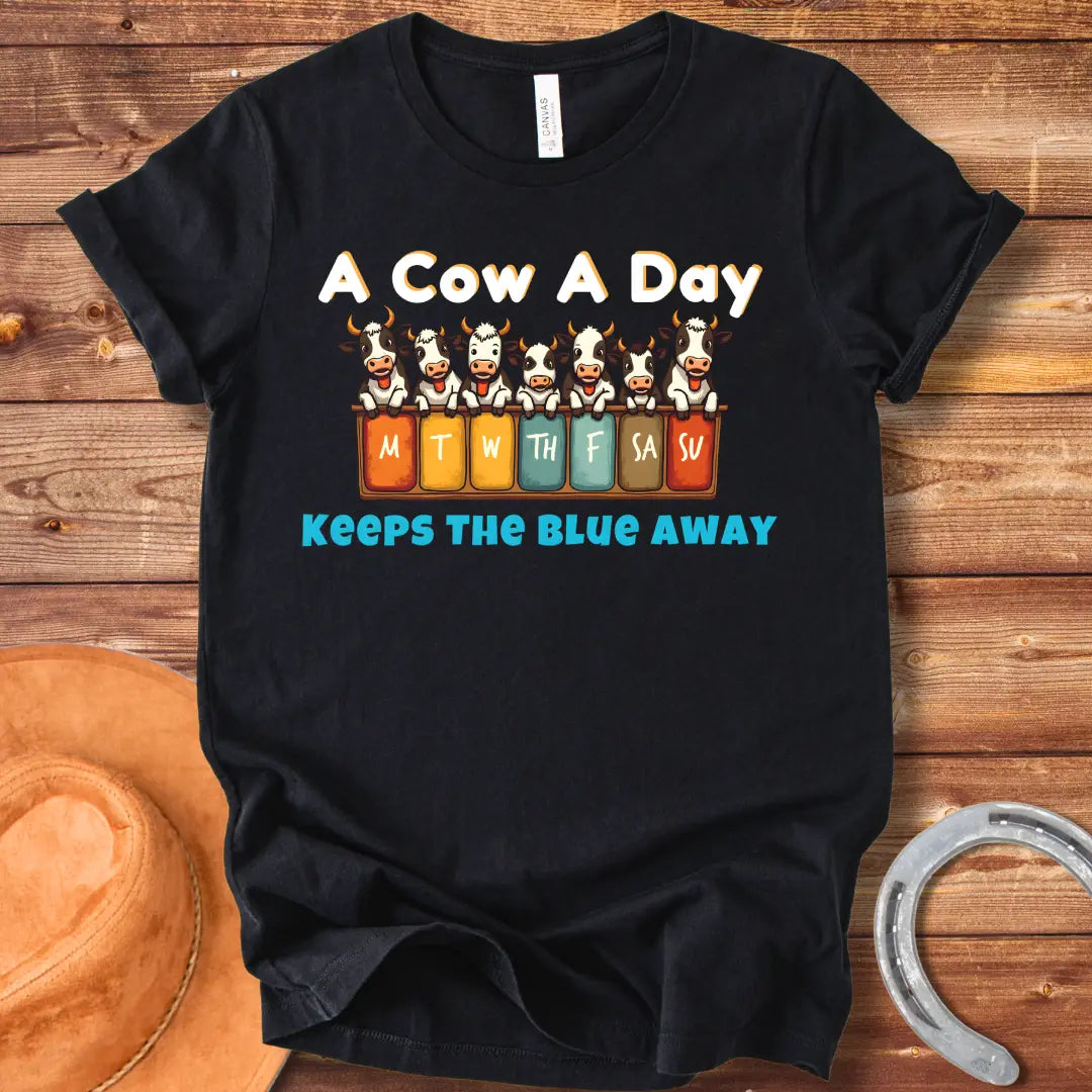 Illustration of seven happy cows each peeking over a box holding days of the week, the text at the bottom saying 'Keeps the Blue Away'.