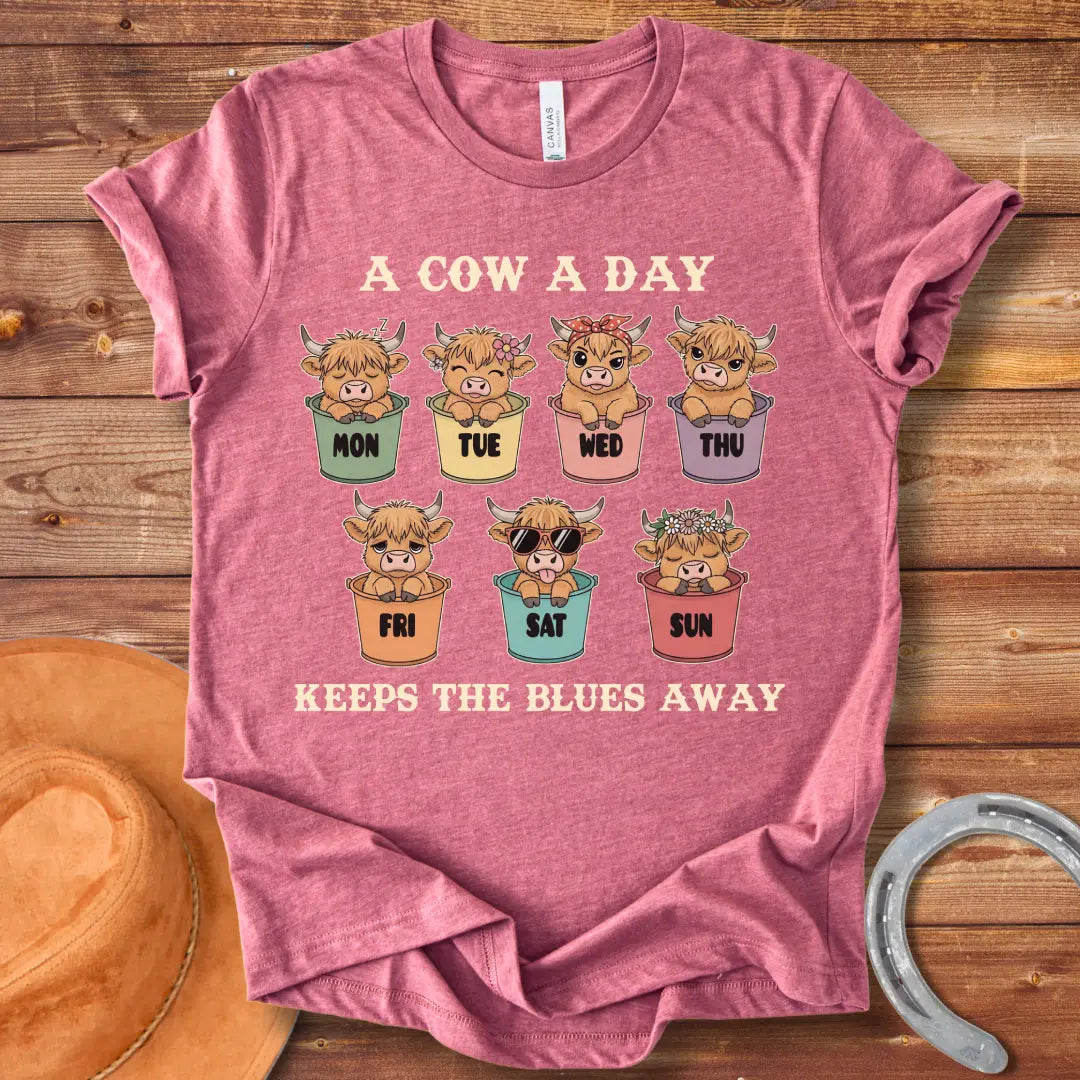 A Cow A Day Vintage T-Shirt featuring cute cow illustrations for each day of the week, designed for cow lovers.