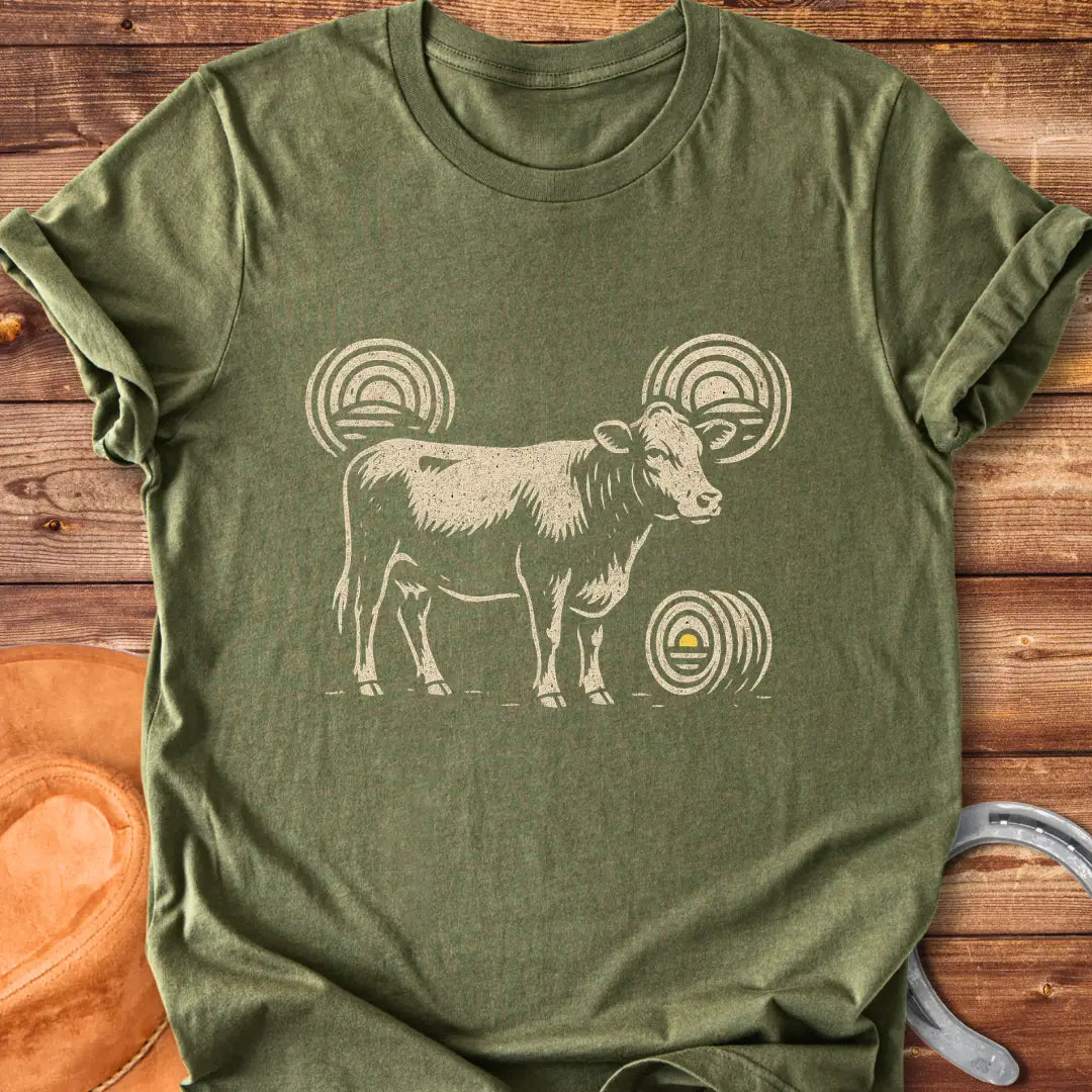 Abstract design t-shirt featuring a cow silhouette and stylized hay bales.