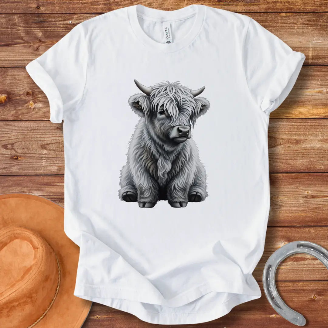 Illustration of a cute baby Highland cow with long white fur and small horns, sitting down and looking friendly.