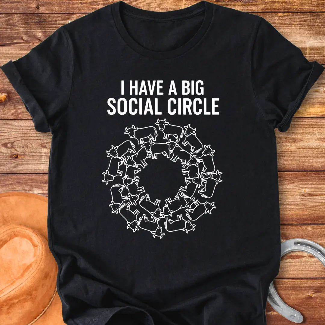 T-shirt with the words 'I have a big social circle' above a circular arrangement of cow illustrations.