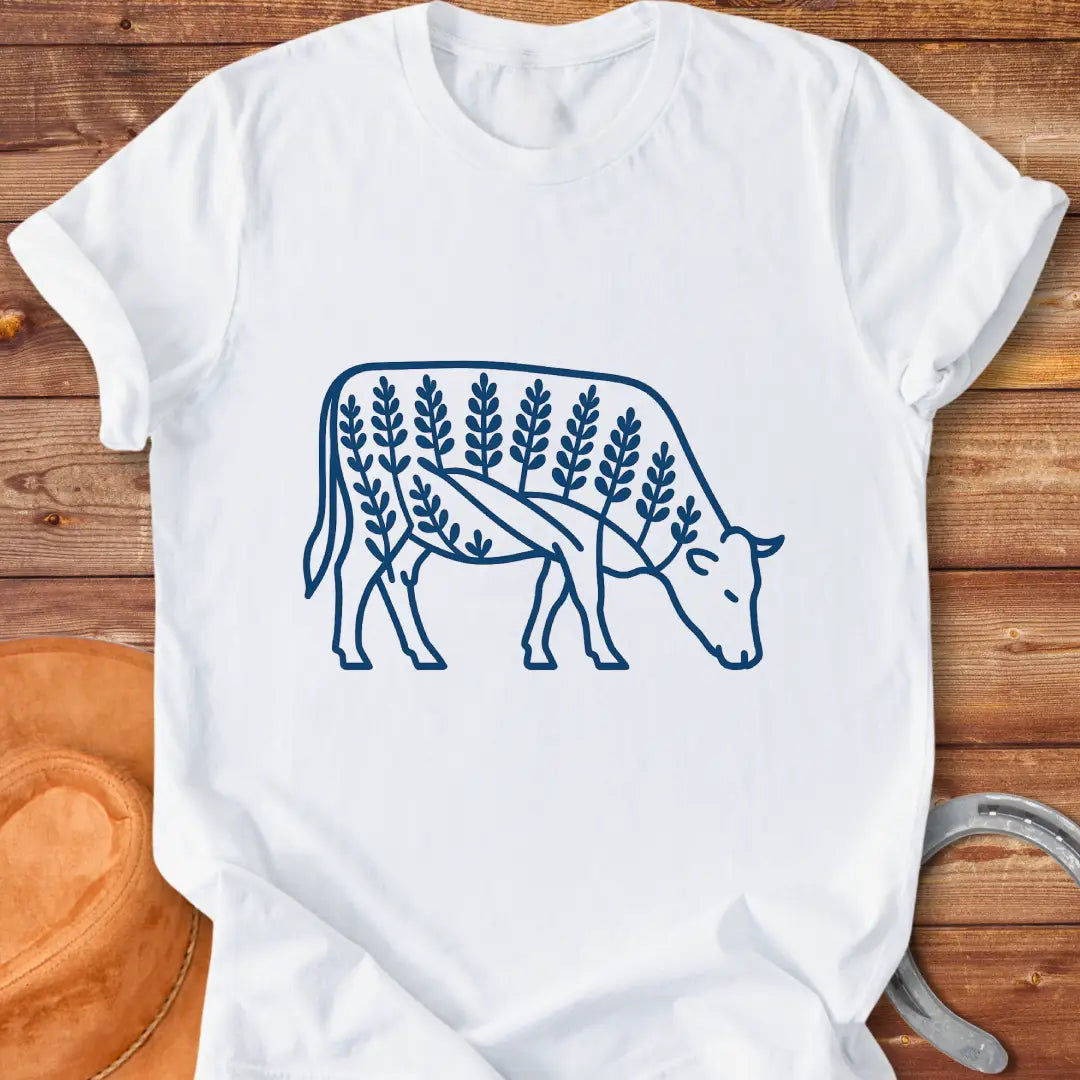 Bluebonnet cow illustration t-shirt design, showing a cow with floral elements within its silhouette.