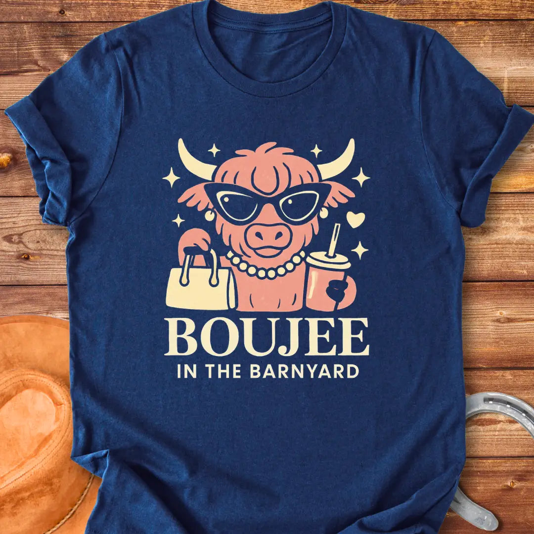 Boujee highland cow wearing sunglasses, pearls, and holding a purse and drink. The design says 'Boujee in the Barnyard'.
