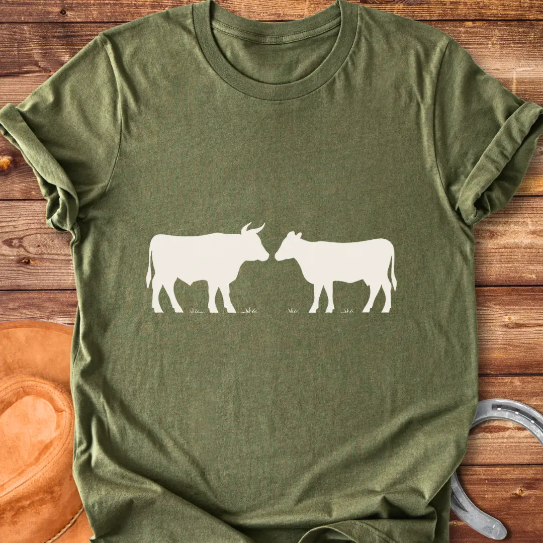 Bull & Heifer Standoff T-Shirt design t-shirt, showing a graphic of a cow.