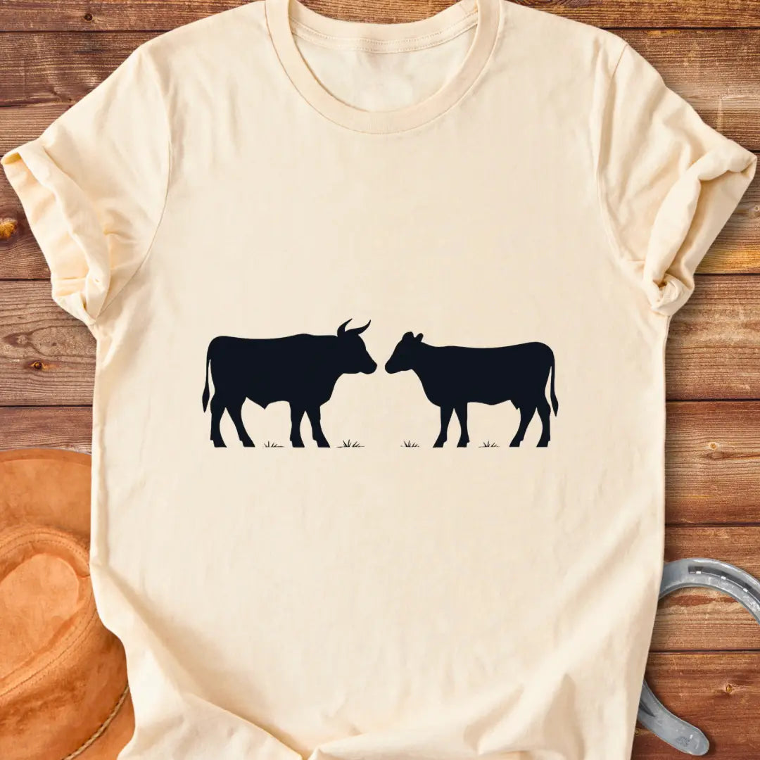 Bull & Heifer Standoff T-Shirt design t-shirt, showing a graphic of a cow.