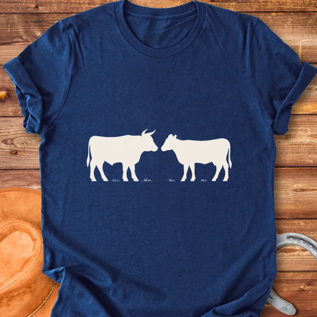 Bull & Heifer Standoff T-Shirt design t-shirt, showing a graphic of a cow.
