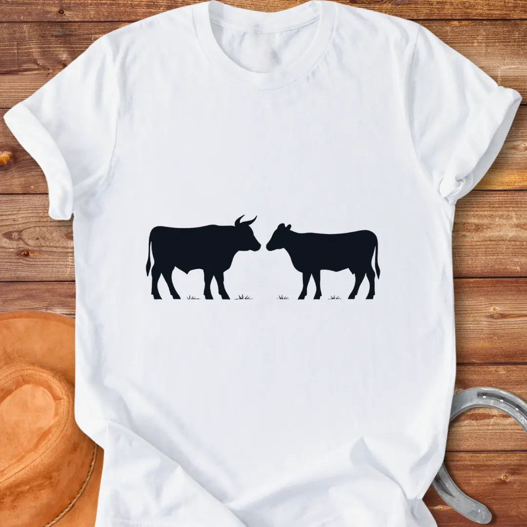 Bull & Heifer Standoff T-Shirt design t-shirt, showing a graphic of a cow.