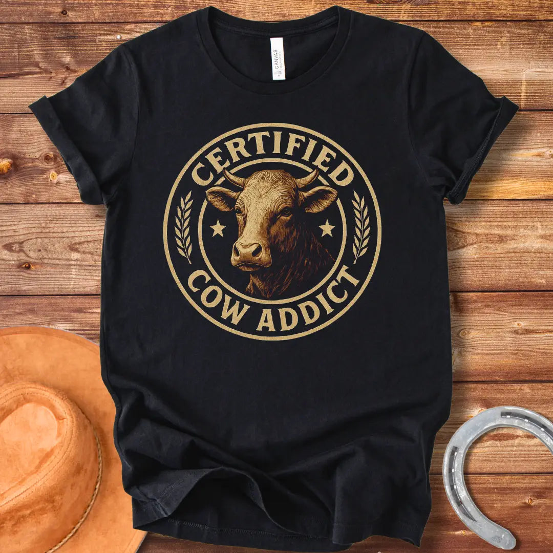 Certified Cow Addict T-Shirt design featuring a detailed cow portrait inside a circular badge.
