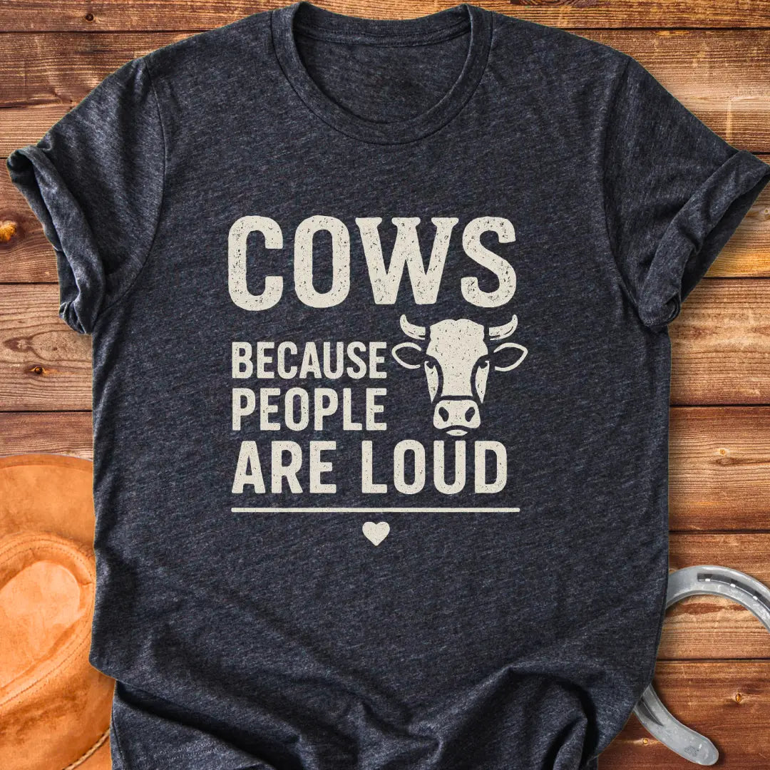 Black t-shirt with the text 'Cows Because People Are Loud' and a cow silhouette, a heart beneath the text.