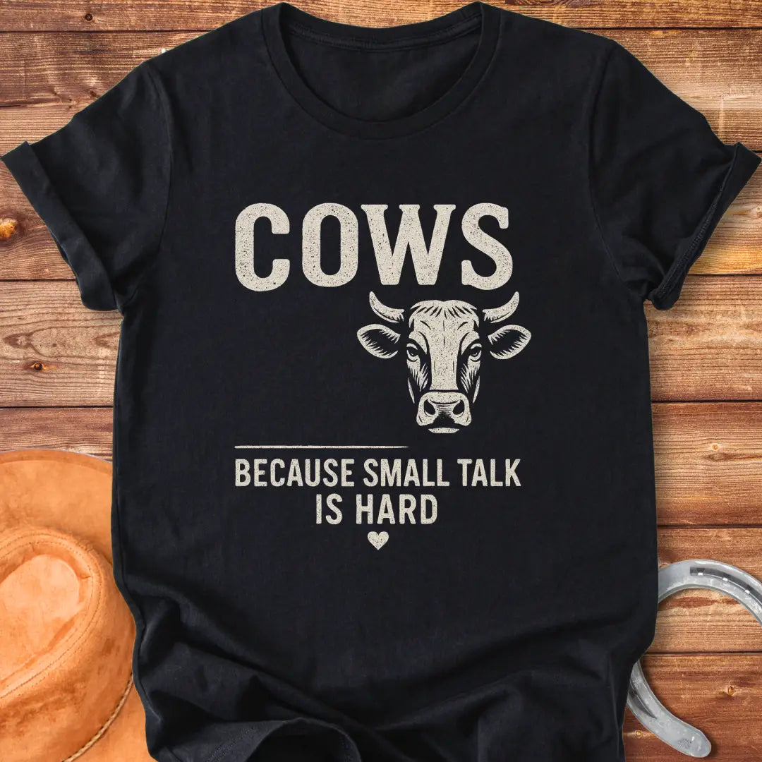 Black t-shirt with the words 'Cows' above 'Because Small Talk Is Hard'
