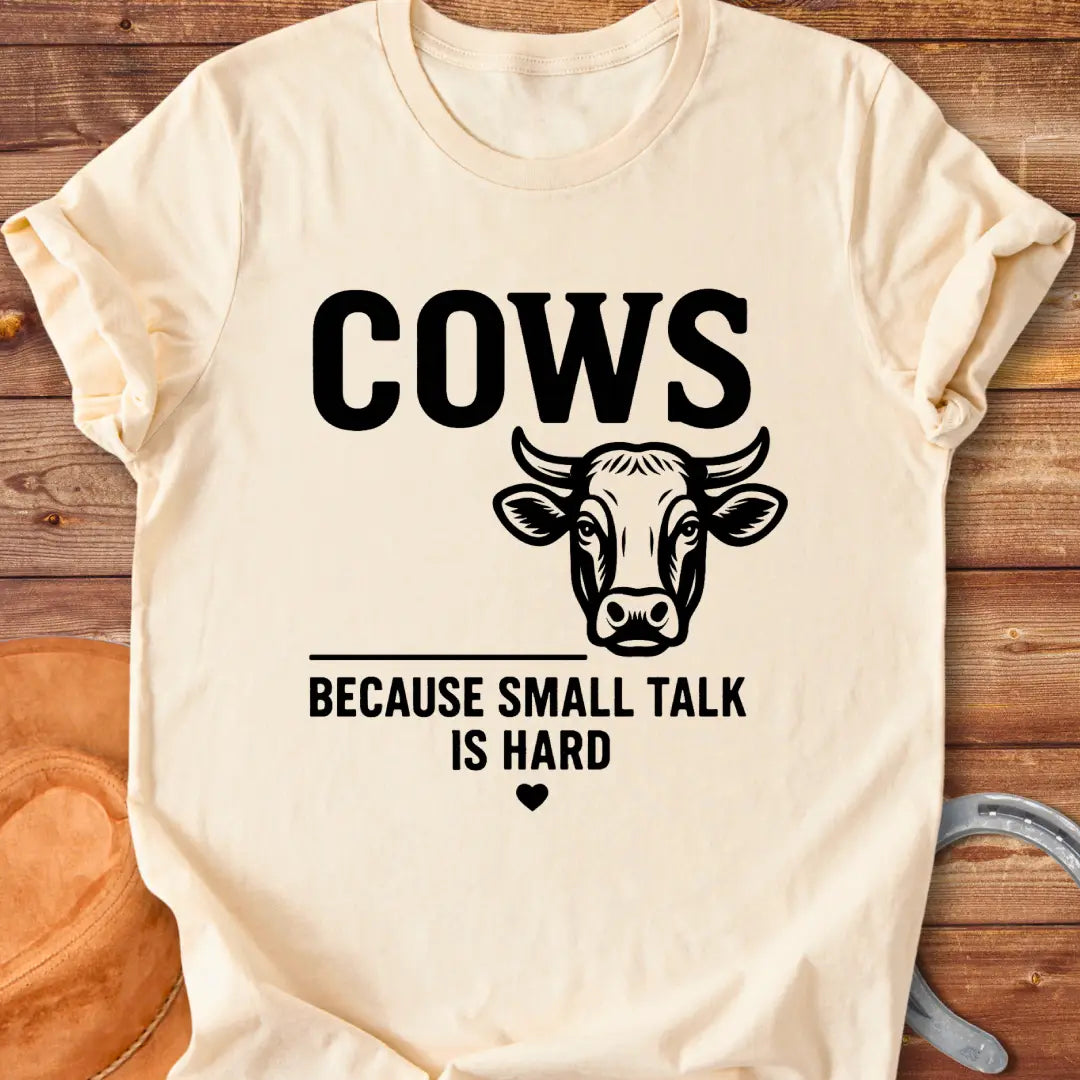 Black t-shirt with the words 'Cows' above 'Because Small Talk Is Hard'