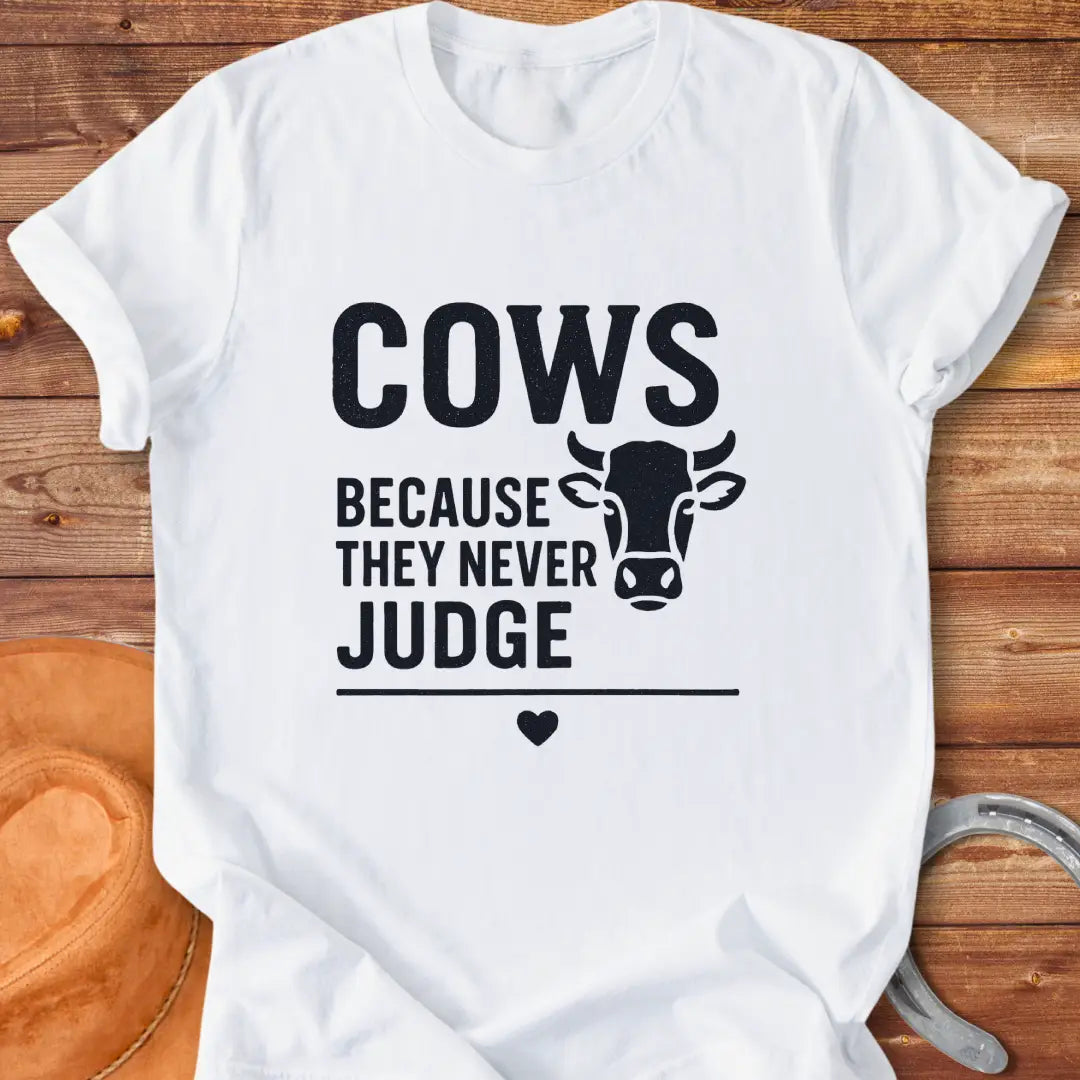 Cows Because They Never Judge T-Shirt design featuring a cow illustration