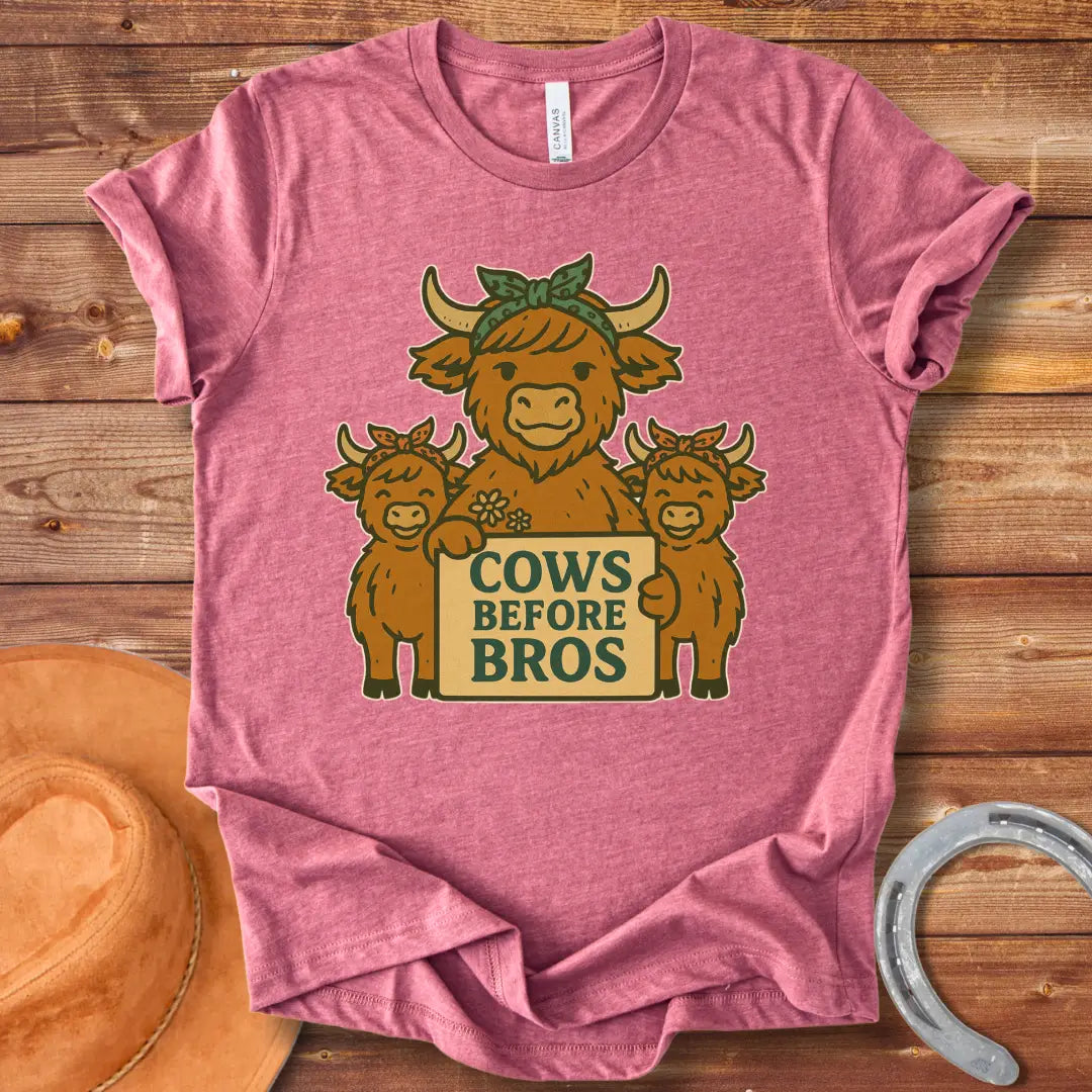 Illustration of a cow family holding a sign that says "Cows Before Bros"