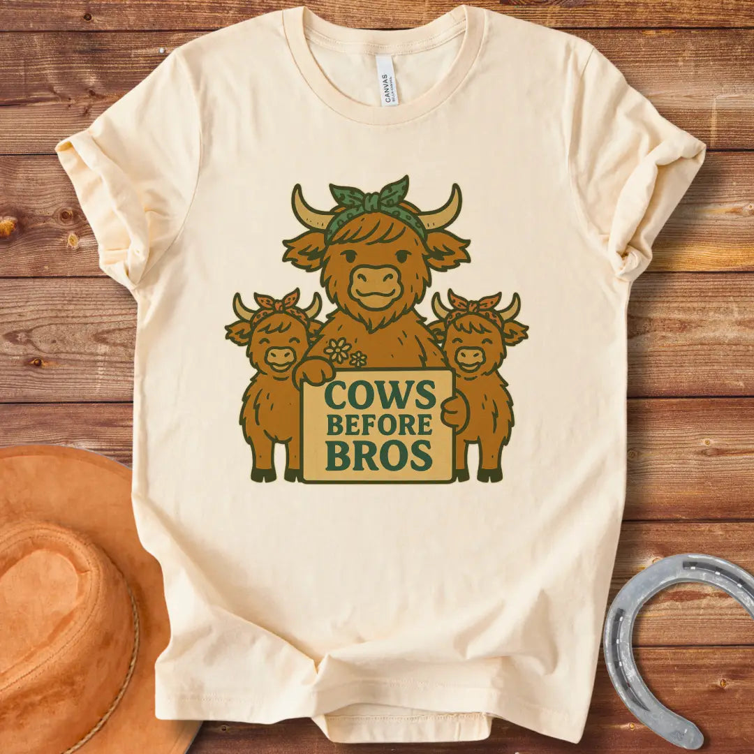 Illustration of a cow family holding a sign that says "Cows Before Bros"