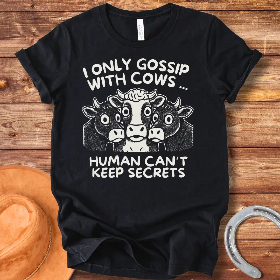 Illustration of three cows huddled together with the text "I Only Gossip With Cows... Humans Can't Keep Secrets".
