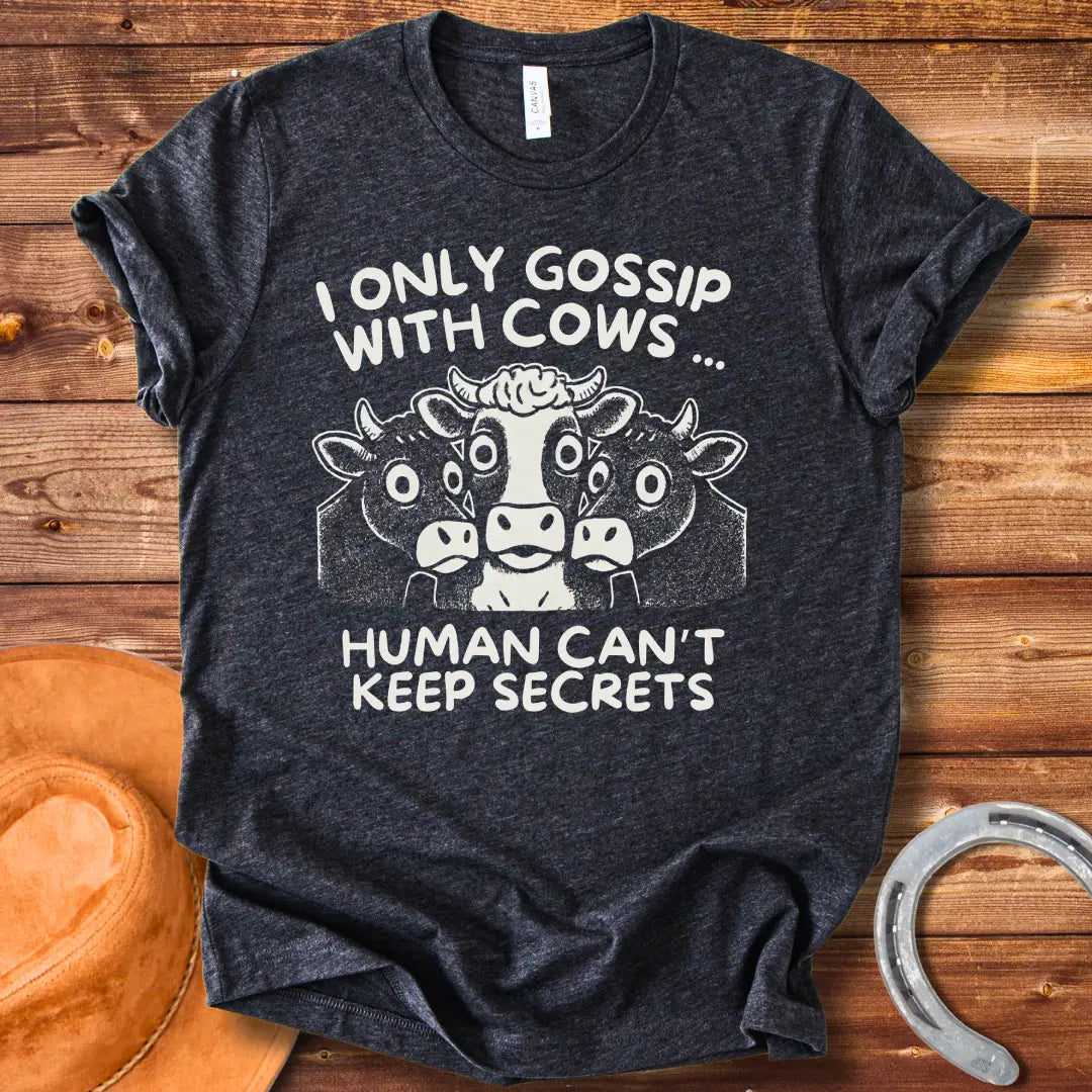 Illustration of three cows huddled together with the text "I Only Gossip With Cows... Humans Can't Keep Secrets".