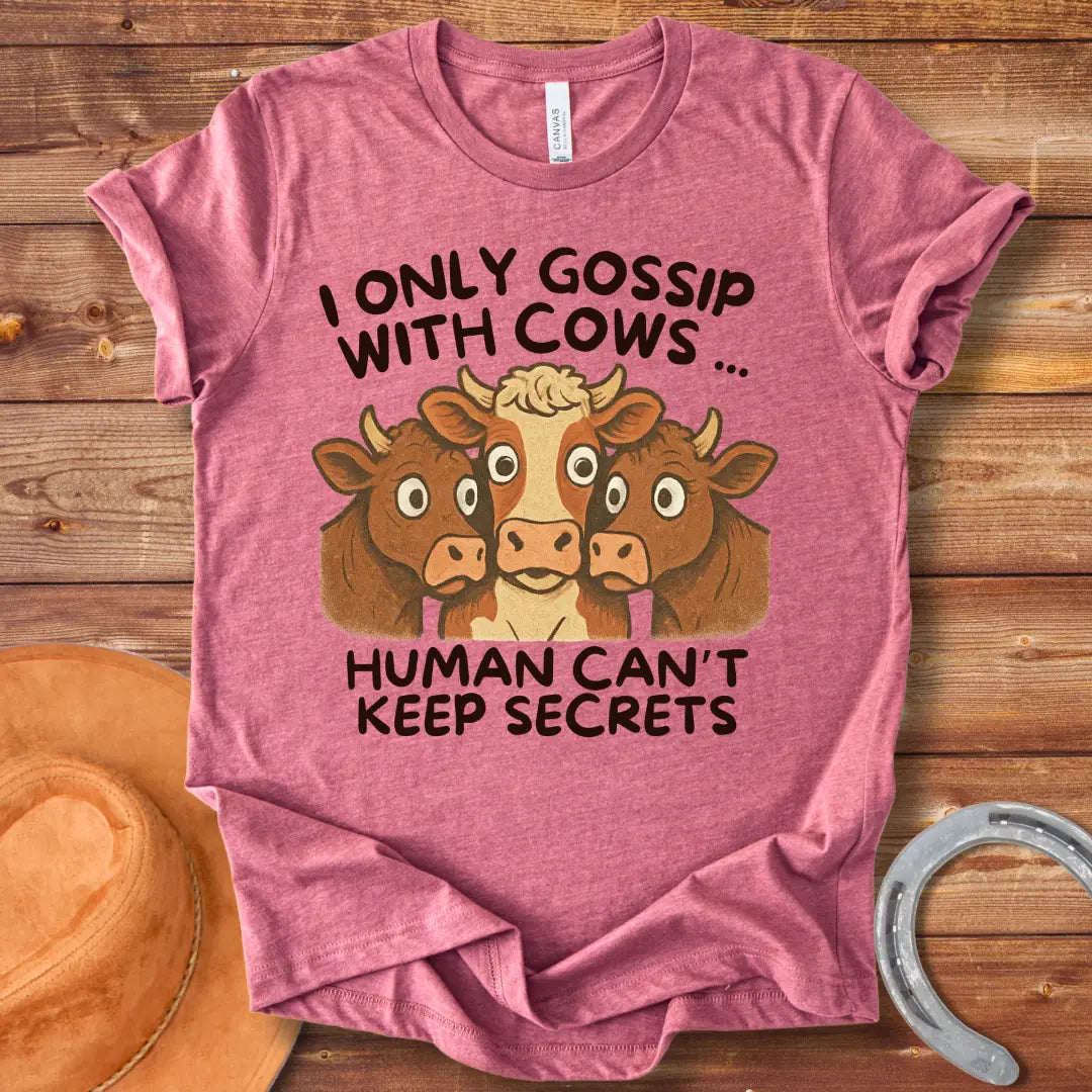 Illustration of three cows huddled together with the text "I Only Gossip With Cows... Humans Can't Keep Secrets".