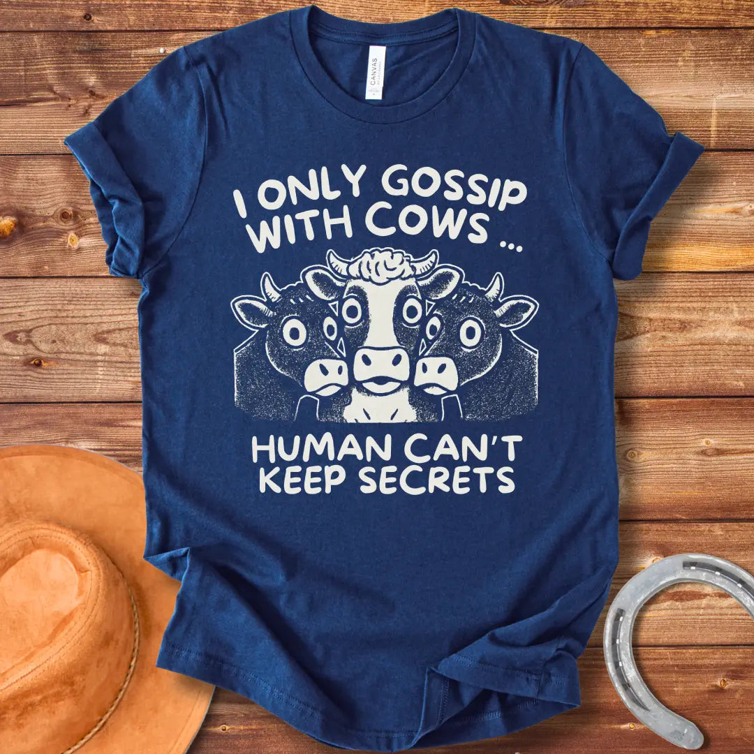 Illustration of three cows huddled together with the text "I Only Gossip With Cows... Humans Can't Keep Secrets".