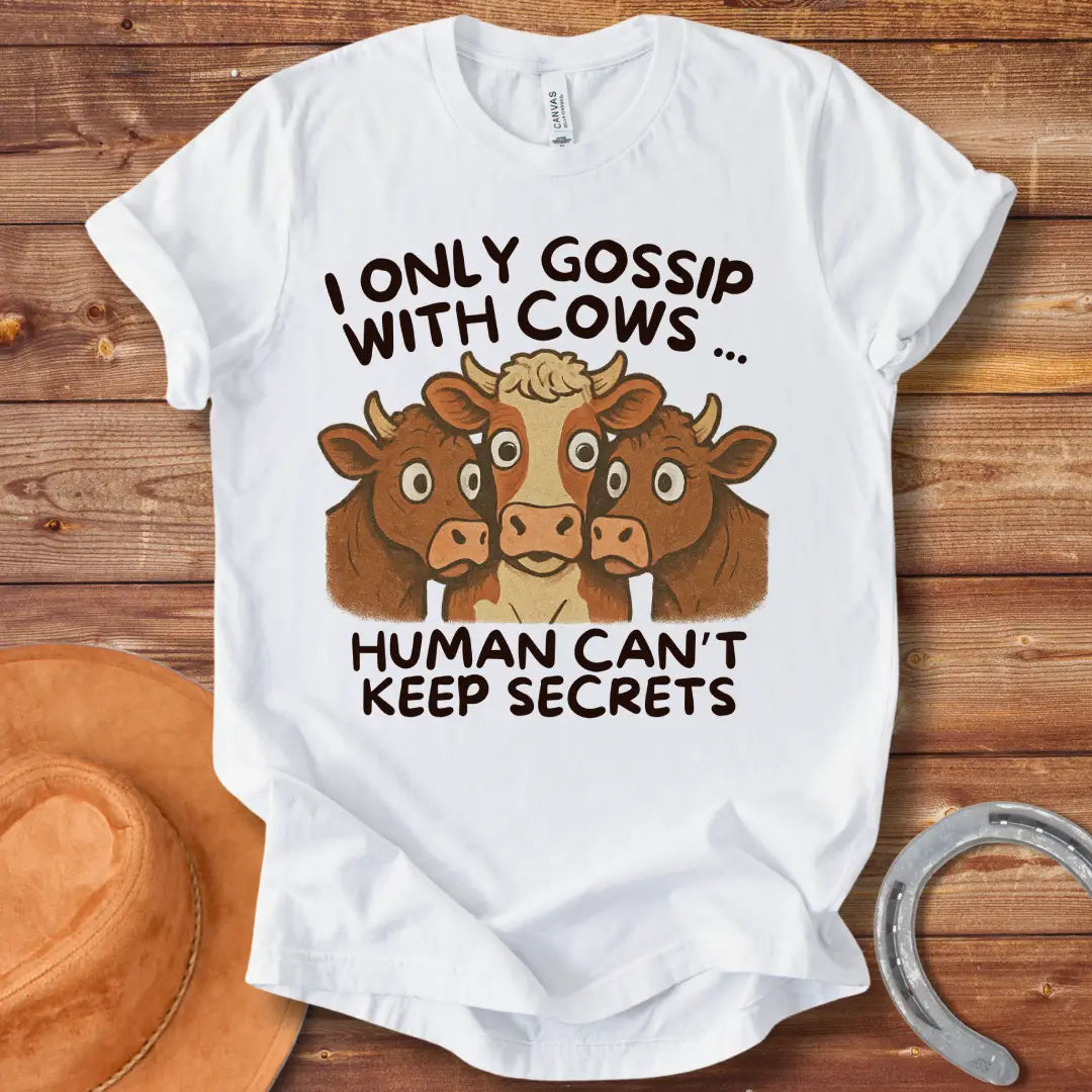 Illustration of three cows huddled together with the text "I Only Gossip With Cows... Humans Can't Keep Secrets".
