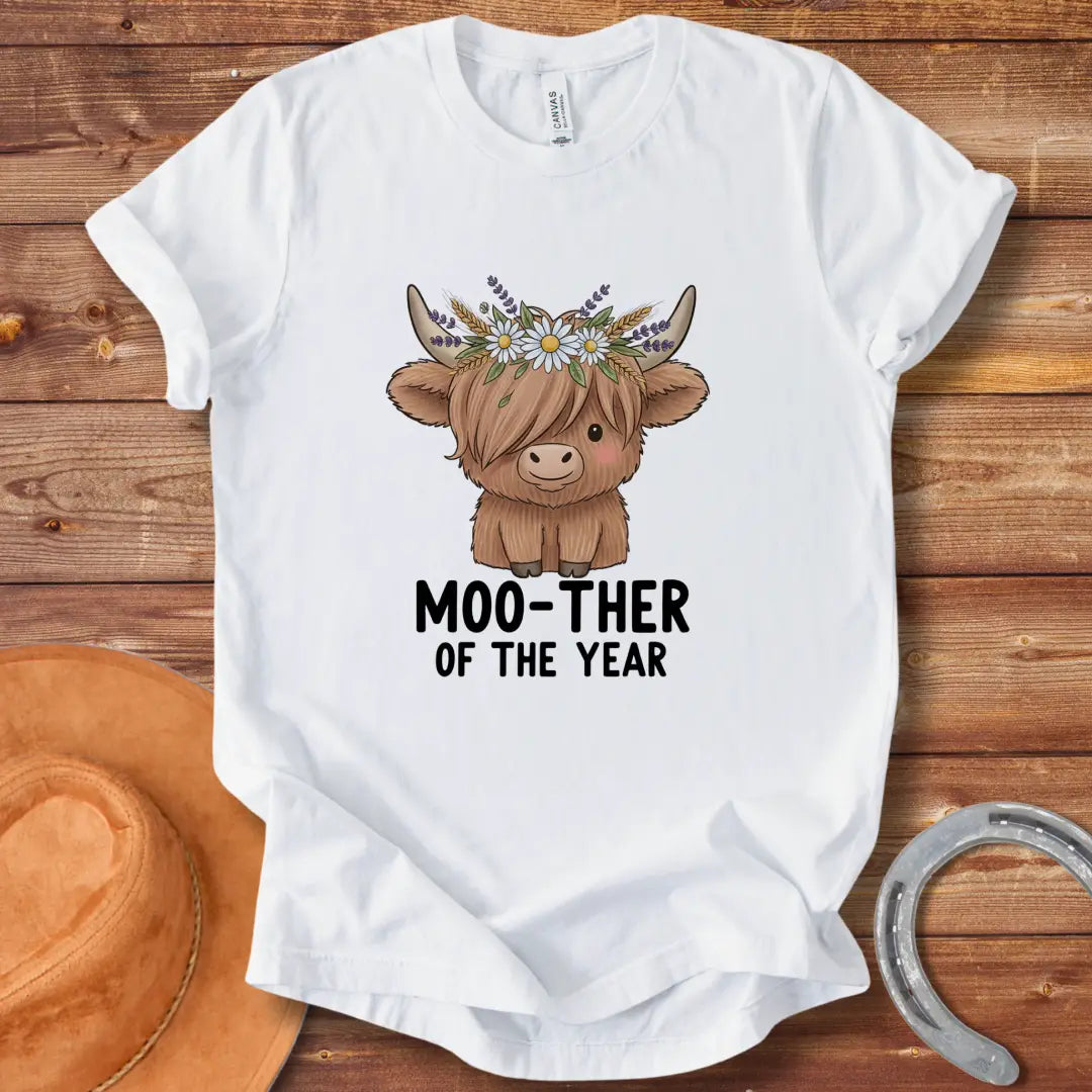 Cute Highland cow wearing a flower crown, with the text 'Moo-ther of the Year'.