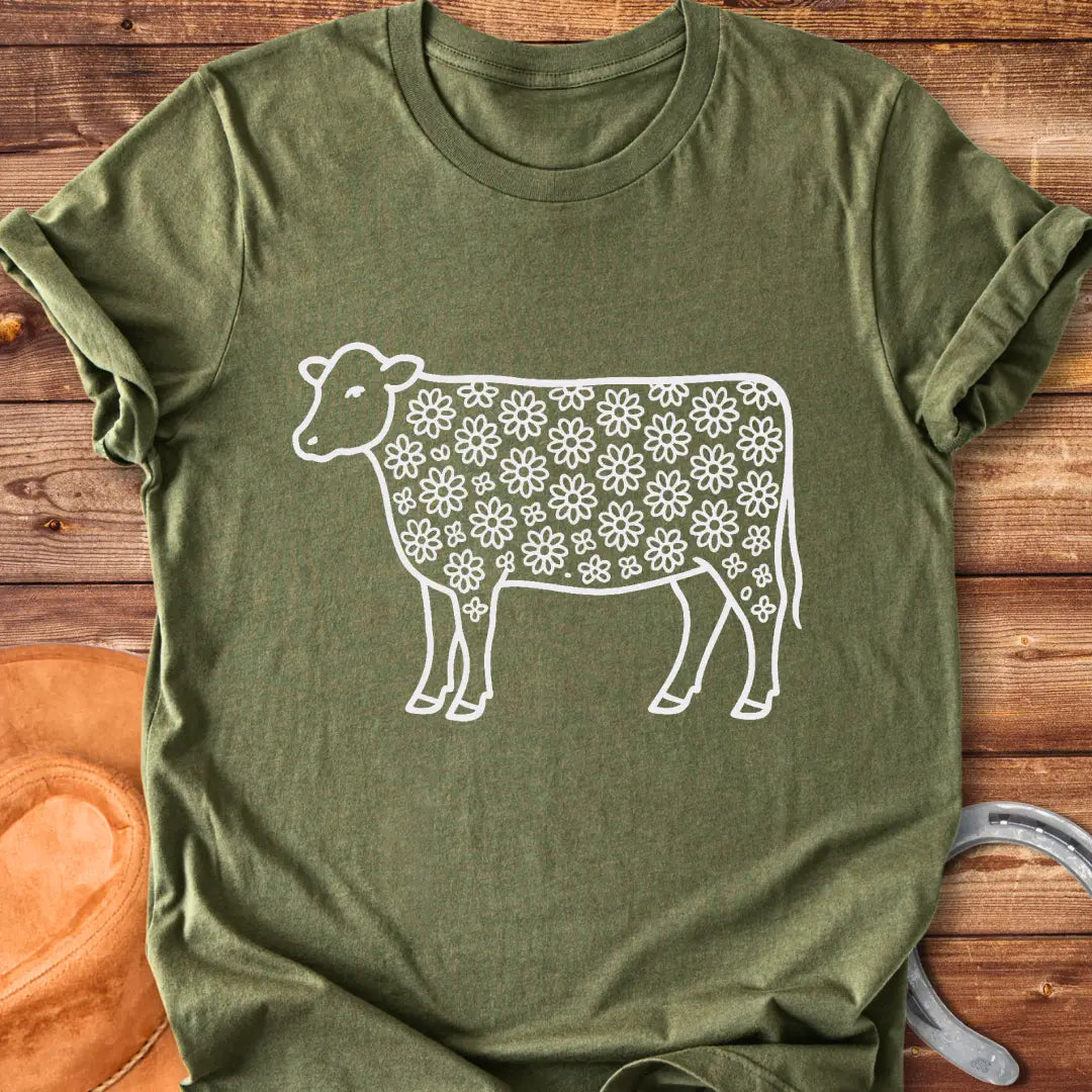 Line art illustration of a cow with a floral pattern filling the body