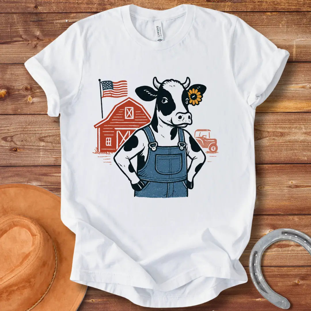 Farm Strong Moo T-Shirt design featuring a cow in overalls, a sunflower, a red barn, American flag, and a vintage truck.