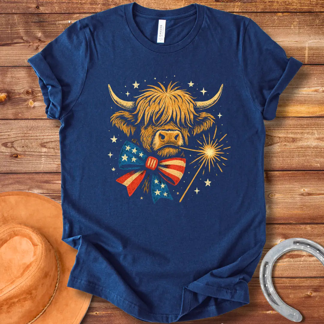 Festive patriotic Highland cow wearing a patriotic bow tie holding a sparkler.