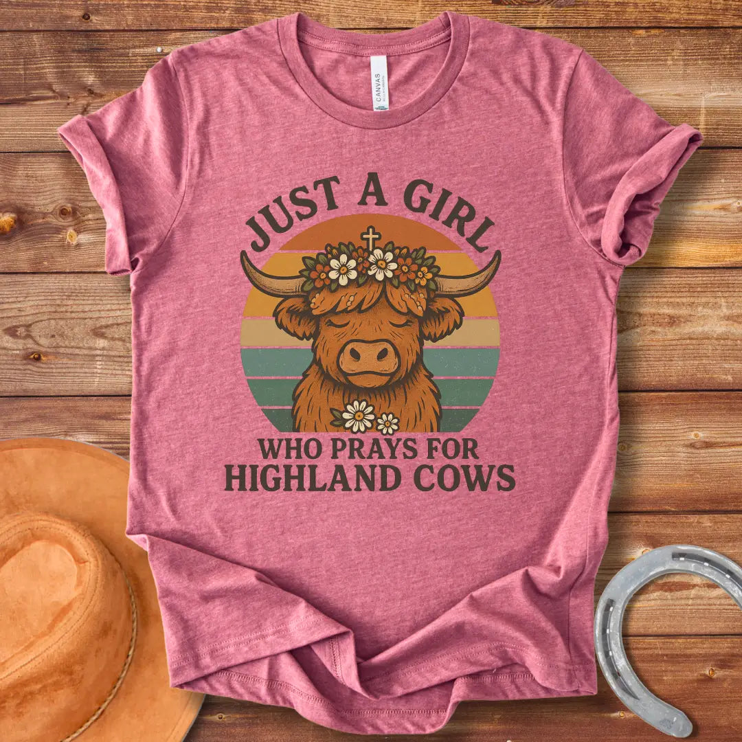 Girl praying for Highland cows t-shirt design featuring a Highland cow with a flower crown and the words 'Just a girl who prays for Highland cows'.