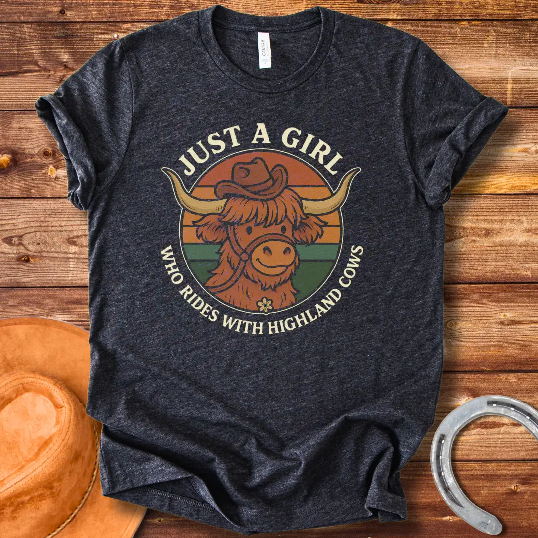 Girl with highland cow t-shirt. A smiling highland cow wearing a hat in a retro design.