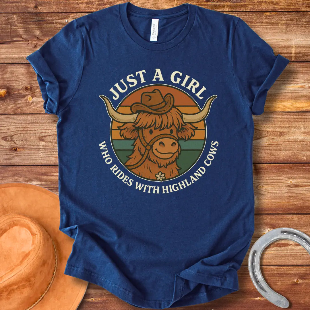 Girl with highland cow t-shirt. A smiling highland cow wearing a hat in a retro design.