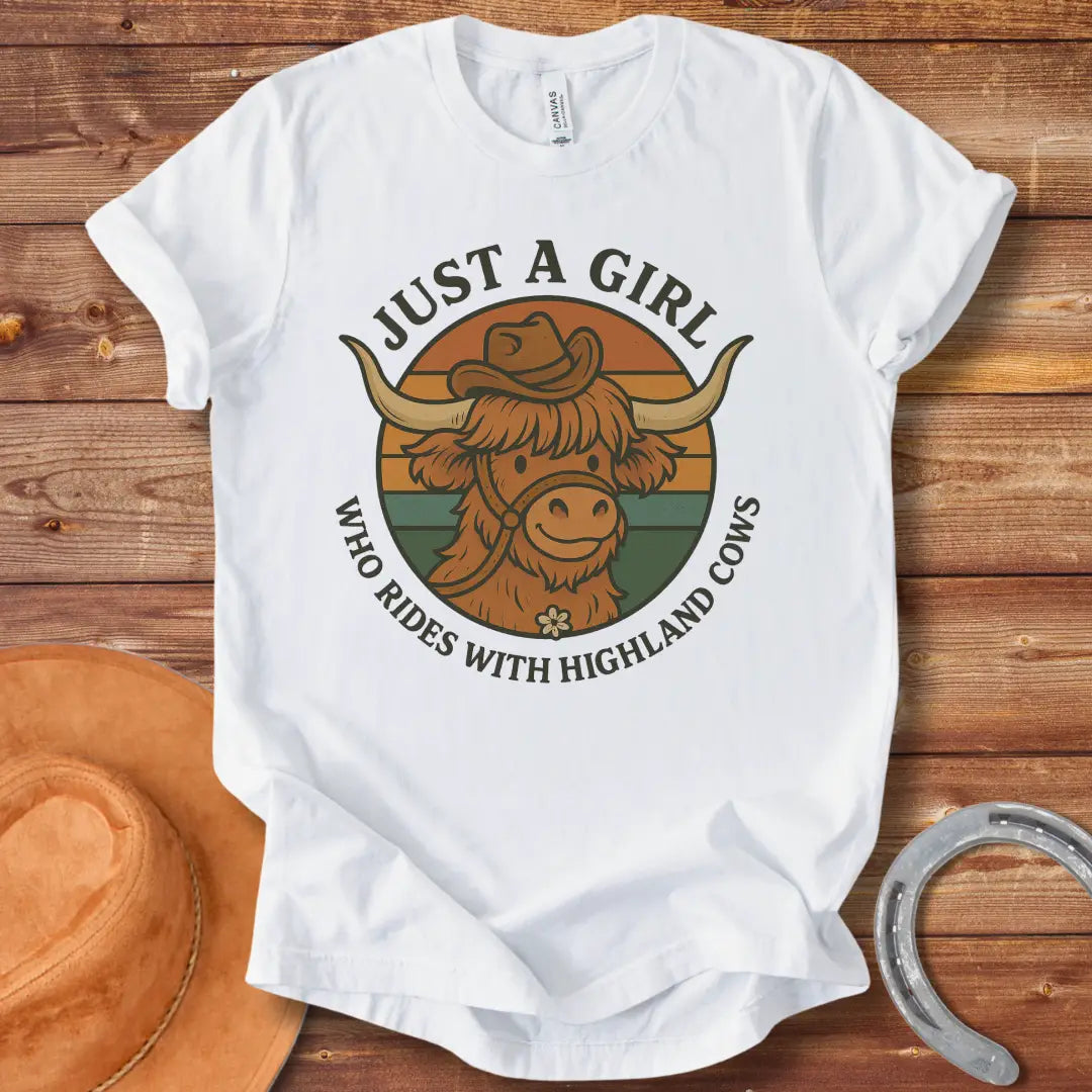 Girl with highland cow t-shirt. A smiling highland cow wearing a hat in a retro design.