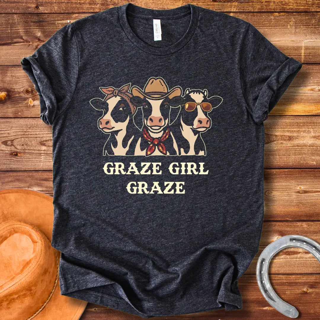 Graze Girl Graze T-Shirt featuring a trio of stylish cows wearing a bandana, a cowboy hat, and sunglasses.
