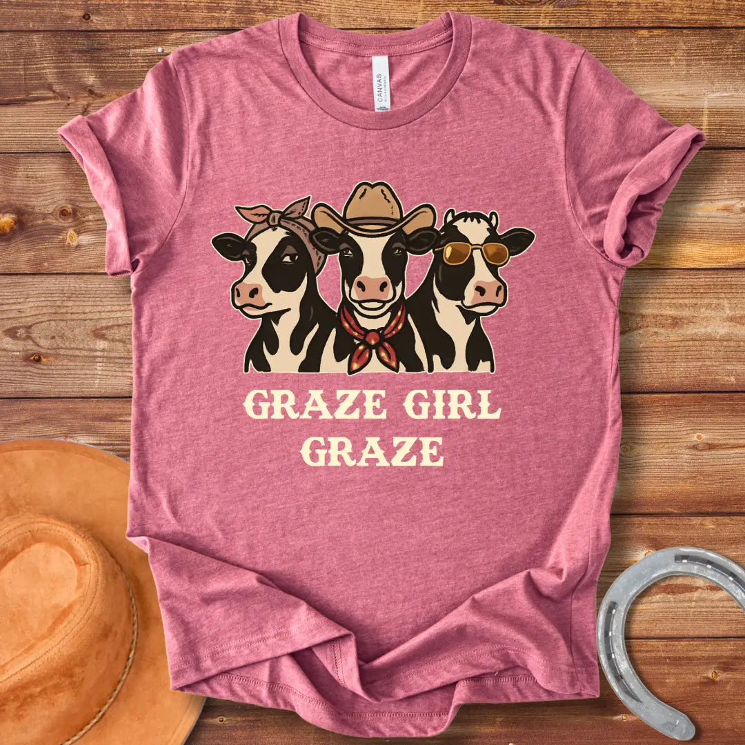 Graze Girl Graze T-Shirt featuring a trio of stylish cows wearing a bandana, a cowboy hat, and sunglasses.