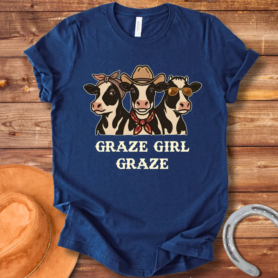 Graze Girl Graze T-Shirt featuring a trio of stylish cows wearing a bandana, a cowboy hat, and sunglasses.