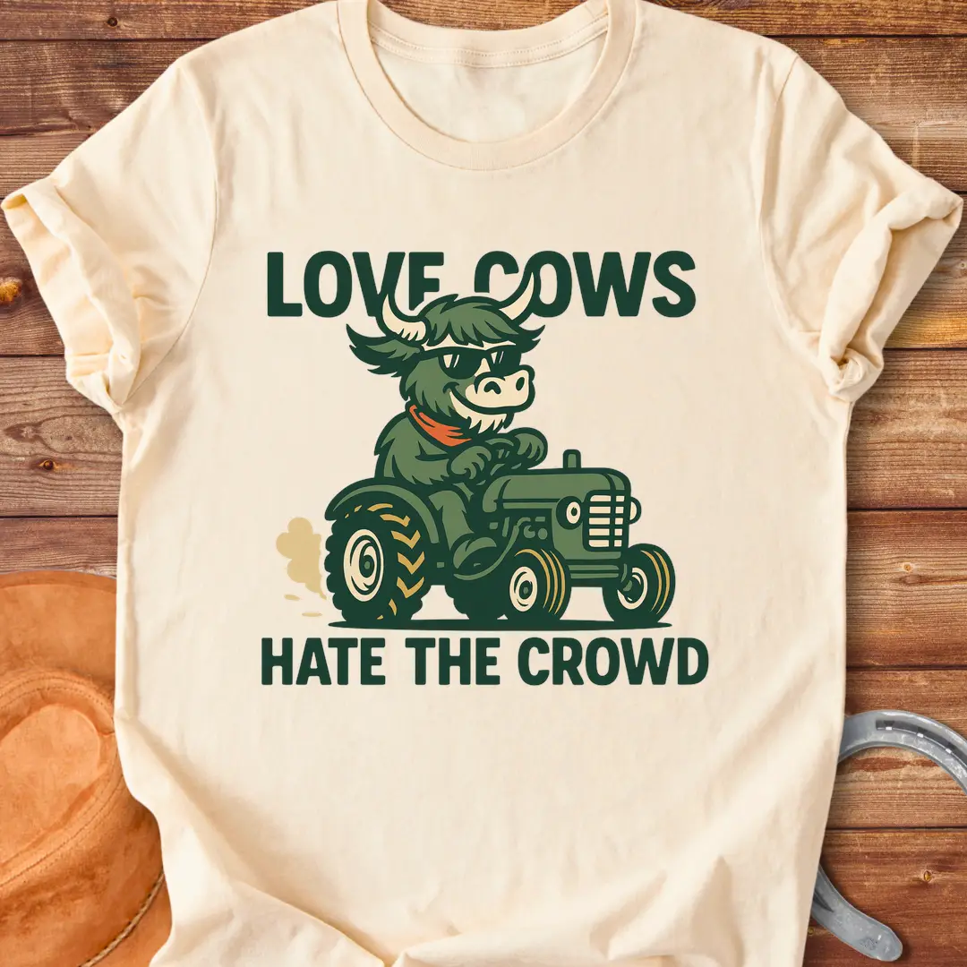 Cool cow in sunglasses driving a tractor, the text says: Love Cows, Hate The Crowd