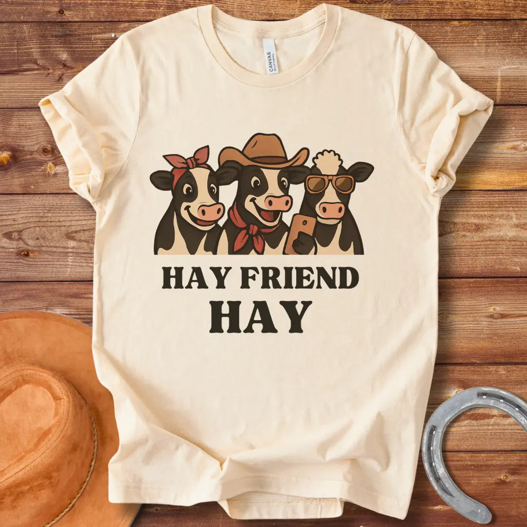 Hay Friend Hay T-Shirt featuring three happy cows with a western look.