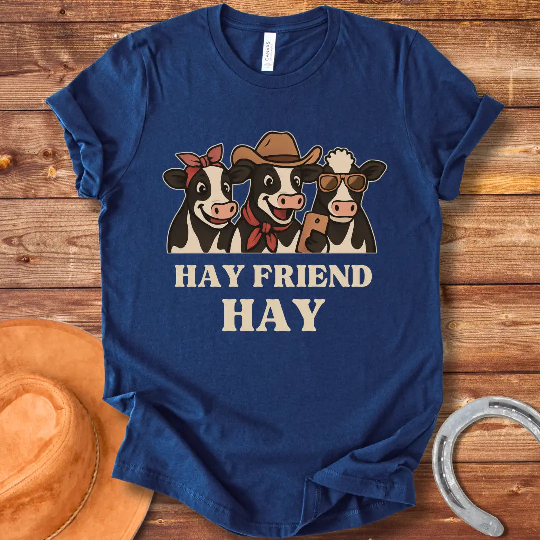 Hay Friend Hay T-Shirt featuring three happy cows with a western look.