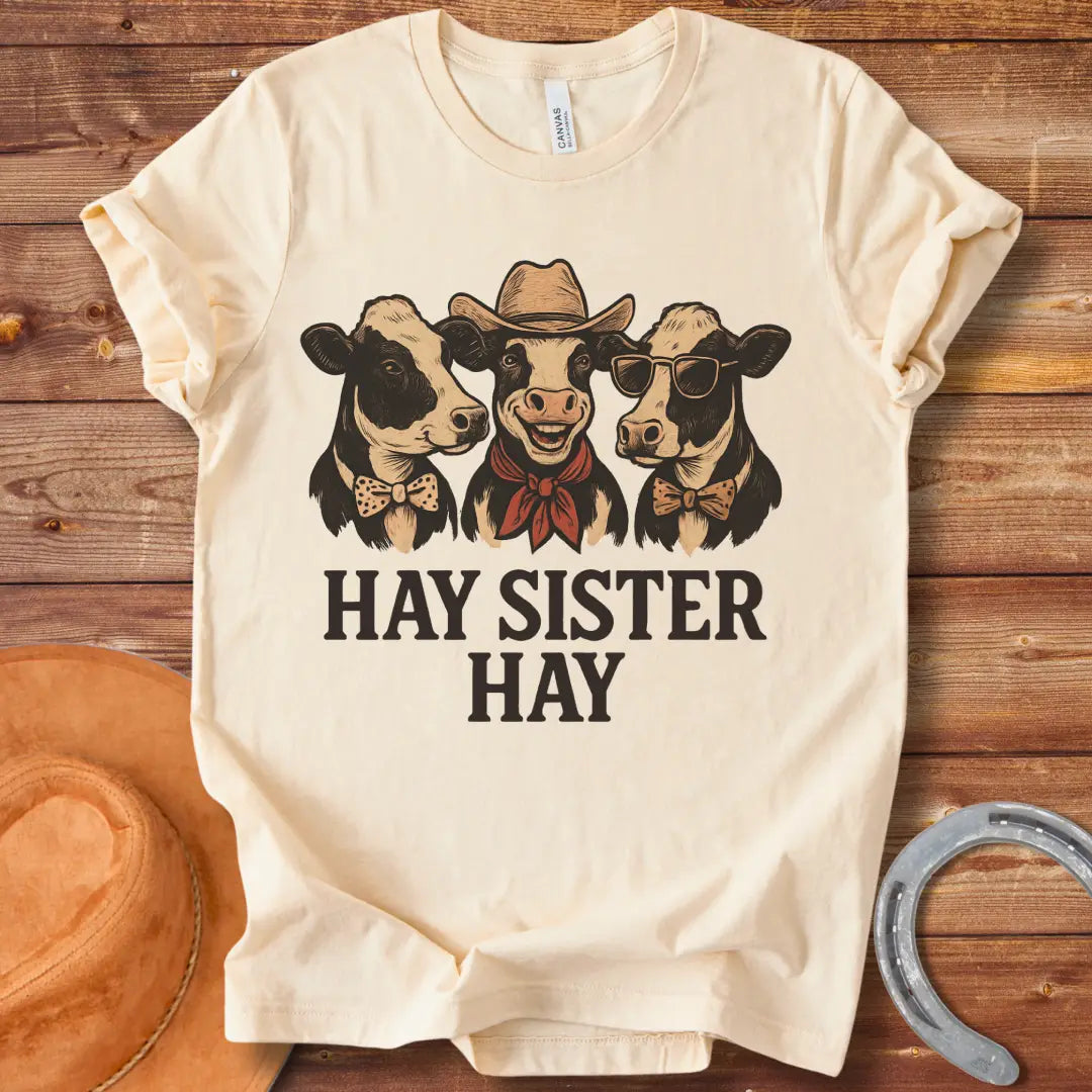Hay Sister Hay T-Shirt featuring three stylish cows in bowties and a cowboy hat.