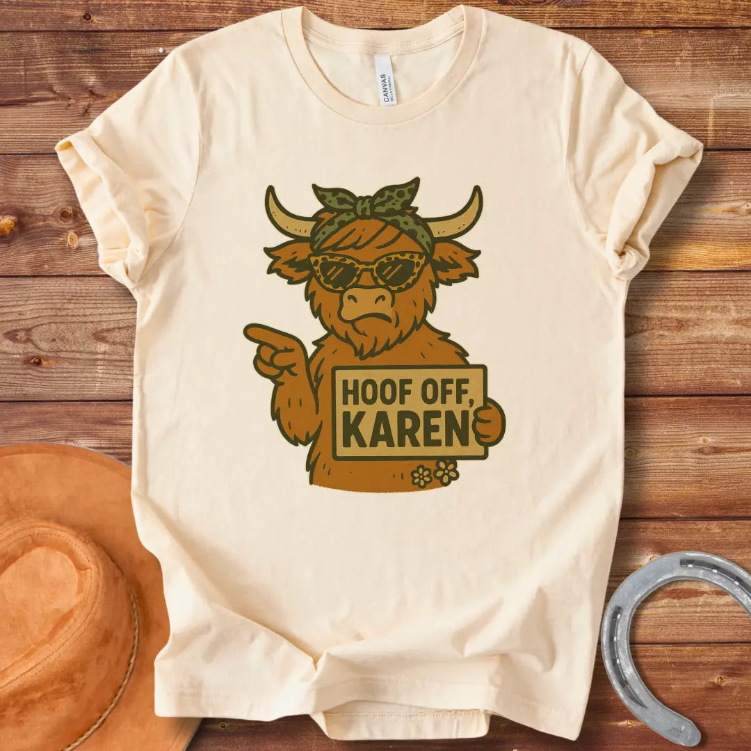 Funny t-shirt featuring a cow wearing sunglasses and holding a sign that says 'Hoof Off, Karen!'
