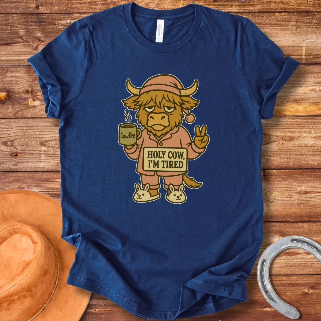 Illustration of a tired cow in pajamas holding a coffee mug that says 'Cowfee,' holding up a peace sign, and wearing bunny slippers. Text on the cow's sign reads 'Holy Cow, I'm Tired.'