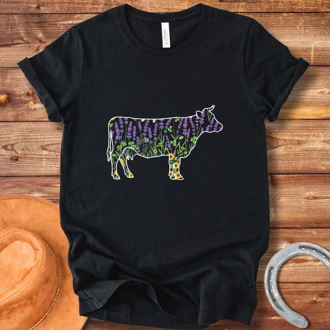Silhouette of a cow filled with lavender, sunflowers, and clover flowers.