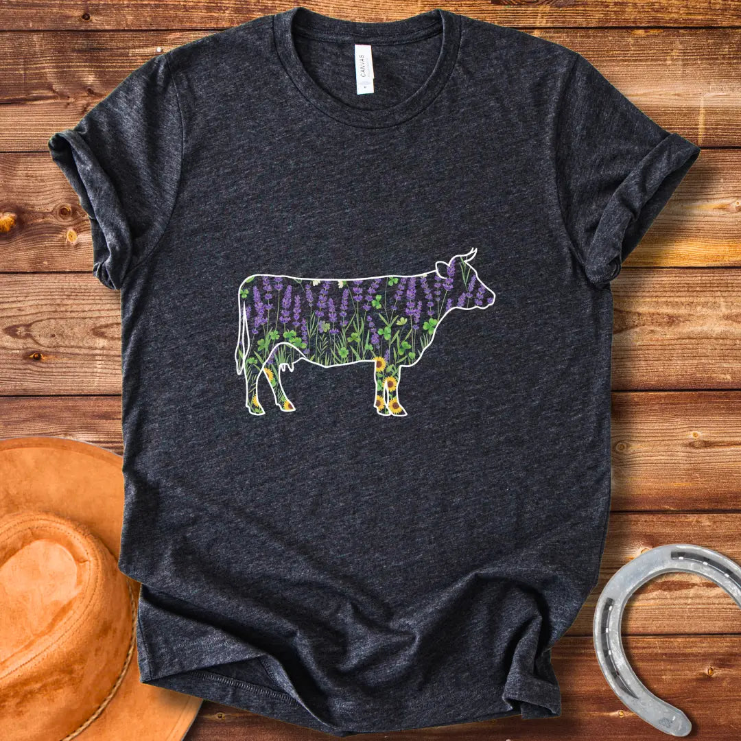 Silhouette of a cow filled with lavender, sunflowers, and clover flowers.