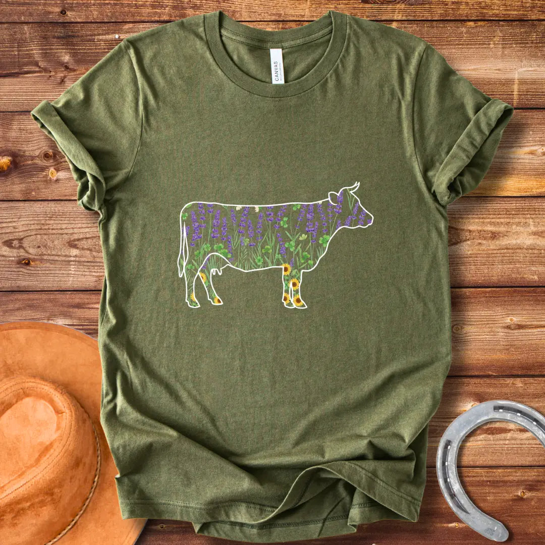 Silhouette of a cow filled with lavender, sunflowers, and clover flowers.