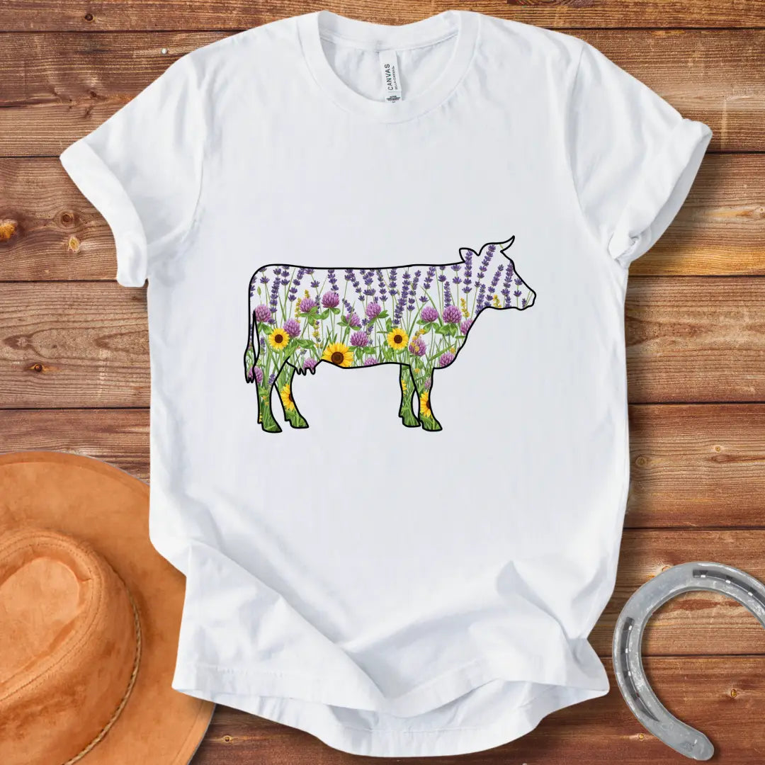 Silhouette of a cow filled with lavender, sunflowers, and clover flowers.