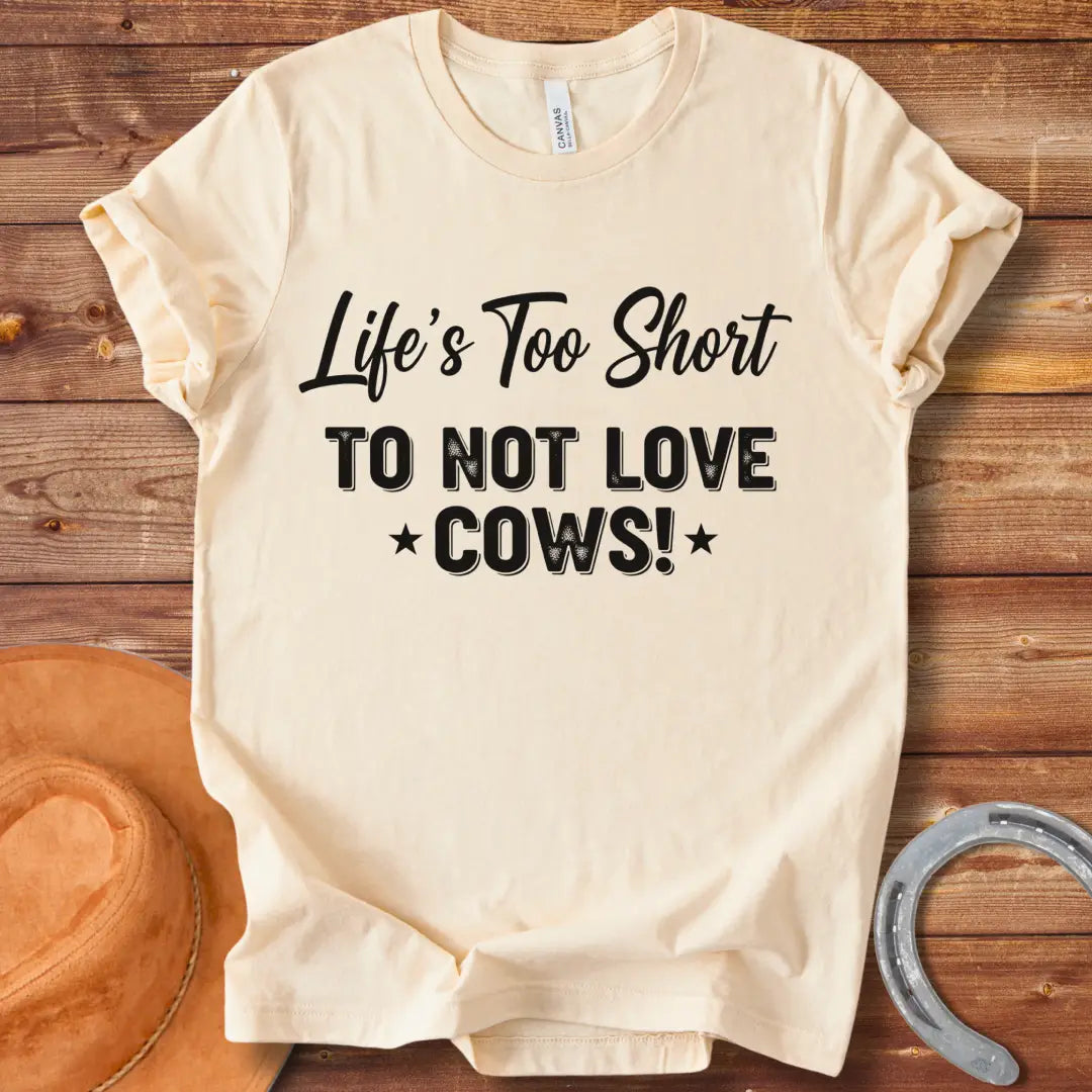 A black t-shirt design with the text 'Life's Too Short To Not Love Cows!'