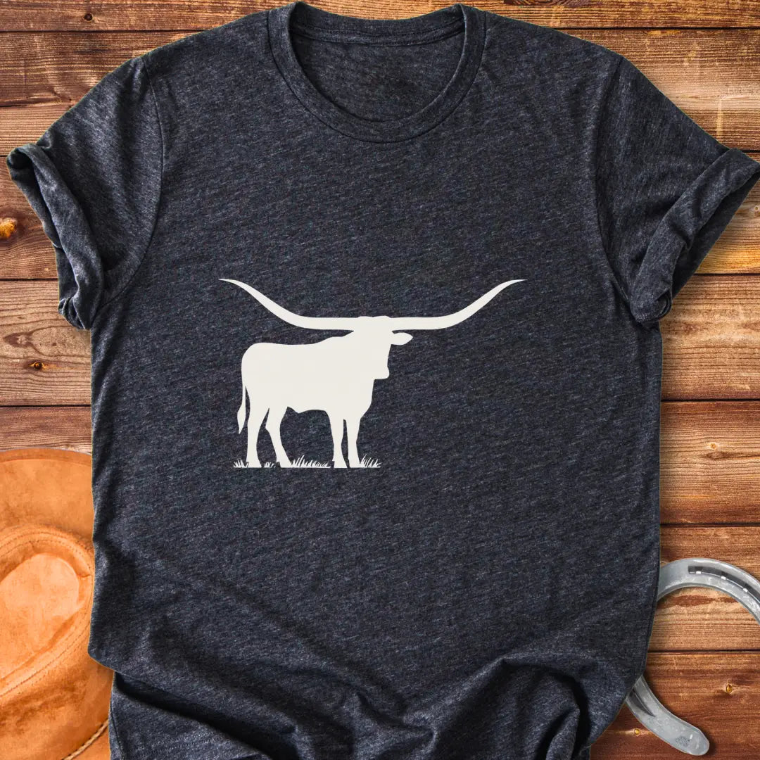 Silhouette of a longhorn on a prairie background, perfect for cow lovers.