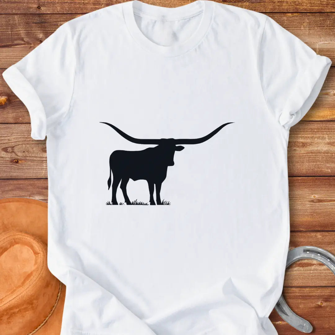 Silhouette of a longhorn on a prairie background, perfect for cow lovers.