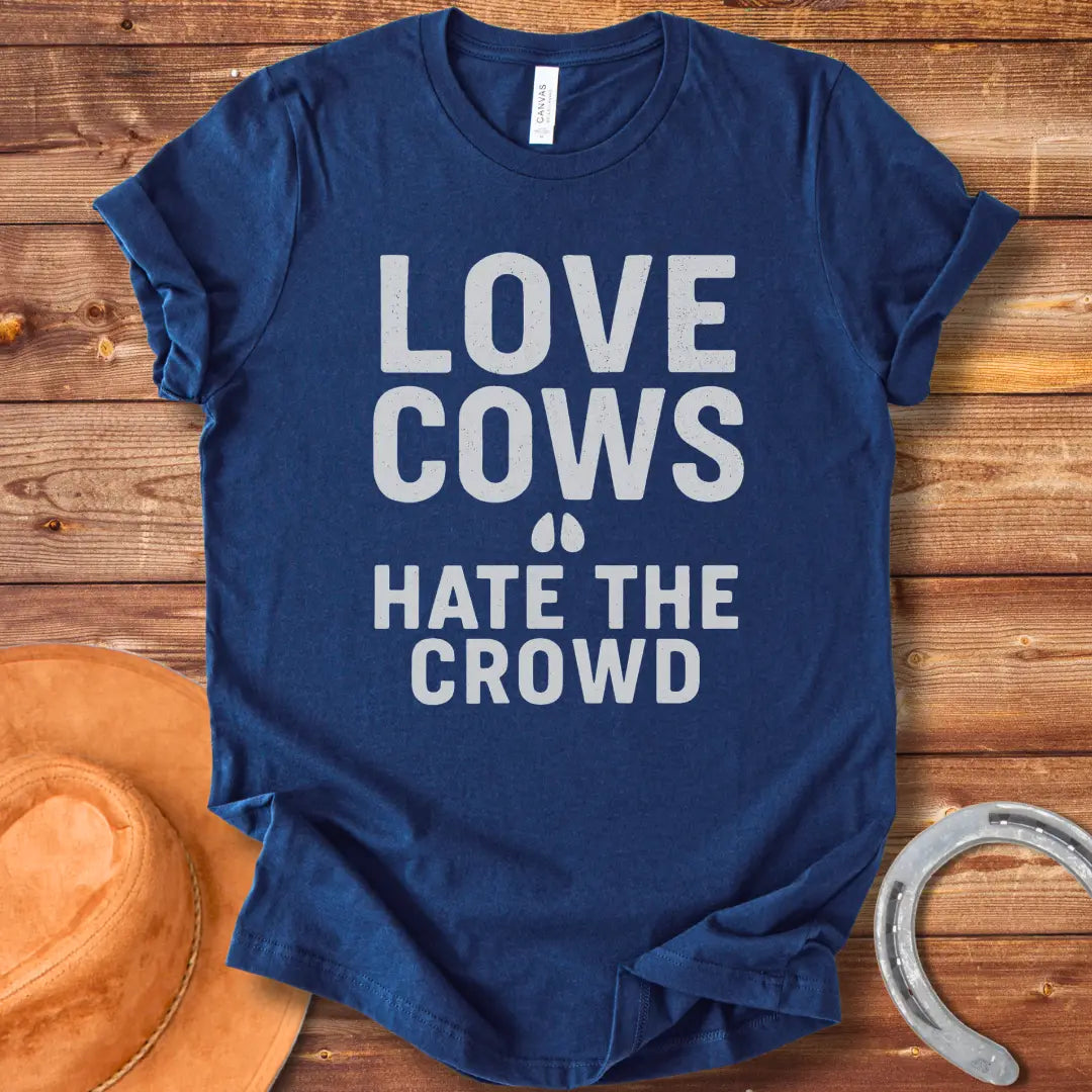 Black text on a black background reads, 'LOVE COWS' with two small hoof prints underneath and the words 'HATE THE CROWD' below.