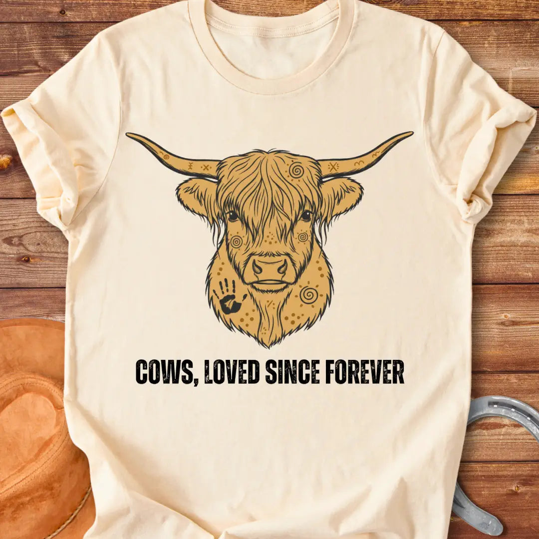 Loved Since Forever T-Shirt featuring a detailed illustration of a Highland cow's face with ornamental details