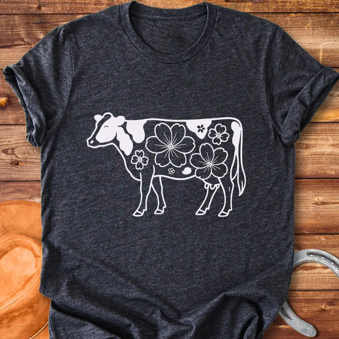 Magnolia Holstein T-Shirt featuring a Holstein cow silhouette with floral design